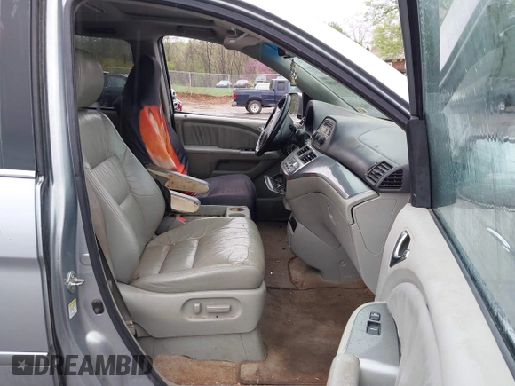 2009 Honda Odyssey EX-L with VIN 5FNRL387X9B043289, listed as a IAAI auction lot 41951208 with 197,184 mi miles and . Bid and sale history available at DreamBid. Image 5.