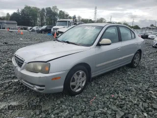 2004 Hyundai Elantra GLS z VIN KMHDN46D24U854129, wystawiony jako Copart lot #51842665 z przebiegiem 224 878 mil mil oraz Szkoda całkowita • Salvage title. Historia ofert i sprzedaży dostępna na DreamBid. Obrazek 1.