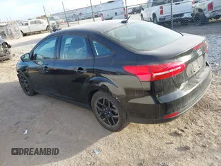 2016 Ford Focus SE z VIN 1FADP3FEXGL310270, wystawiony jako IAAI lot #40956503 z przebiegiem 156 812 mil mil oraz . Historia ofert i sprzedaży dostępna na DreamBid. Obrazek 3.