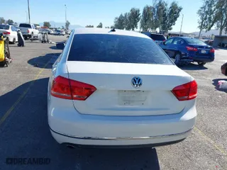 2015 Volkswagen Passat 1.8T SE w/Sunroof & Nav with VIN 1VWBT7A3XFC075648, listed as a IAAI auction lot 40808040 with 189,620 mi miles. Bid and sale history available at carsss.com. Image 16.