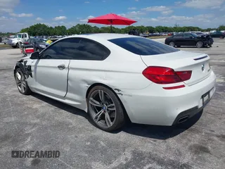 2014 BMW 6 Series 650i with VIN WBAYM9C55ED248244, listed as a IAAI auction lot 42043456 with 144,664 mi miles and . Bid and sale history available at DreamBid. Image 3.
