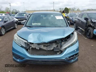 2015 Honda CR-V LX with VIN 2HKRM4H37FH601922, listed as a IAAI auction lot 42126743 with 165,764 mi miles and . Bid and sale history available at DreamBid. Image 12.