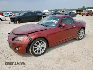 2010 Mazda MX-5 Miata Grand Touring z VIN JM1NC2FF2A0212064, wystawiony jako Copart lot #57957355 z przebiegiem 120 304 mil mil oraz Szkoda całkowita • Salvage title. Historia ofert i sprzedaży dostępna na DreamBid. Obrazek 1.