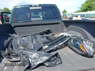 2018 Ram 2500 SLT with VIN 3C6TR5DT2JG166397, listed as a IAAI auction lot 42551256 with 100,040 mi miles and . Bid and sale history available at DreamBid. Image 12.