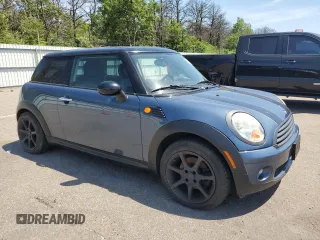 2010 MINI Hardtop with VIN WMWMF3C57ATU79474, listed as a Copart auction lot 61860865 with 137,965 mi miles and Clean title. Bid and sale history available at DreamBid. Image 4.
