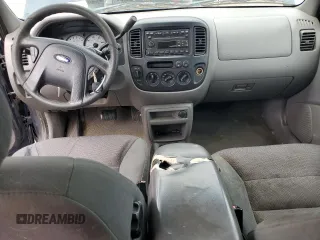 2002 Ford Escape XLT Choice with VIN 1FMYU04192KD87001, listed as a Copart auction lot 57860475 with 195,323 mi miles and Salvage title. Bid and sale history available at DreamBid. Image 8.