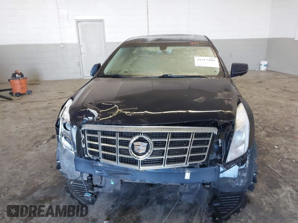 2013 Cadillac XTS Luxury with VIN 2G61P5S34D9200849, listed as a IAAI auction lot 41412189 with 134,932 mi miles. Bid and sale history available at carsss.com. Image 12.