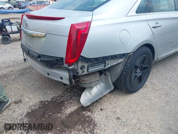 2014 Cadillac XTS Luxury z VIN 2G61N5S38E9270619, wystawiony jako IAAI lot #40140617 z przebiegiem 117 286 mil mil oraz . Historia ofert i sprzedaży dostępna na DreamBid. Obrazek 6.