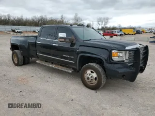 2015 GMC Sierra 3500HD Denali z VIN 1GT424E80FF506967, wystawiony jako Copart lot #49715055 z przebiegiem 191 033 mil mil oraz Czysty tytuł • Clean title. Historia ofert i sprzedaży dostępna na DreamBid. Obrazek 4.