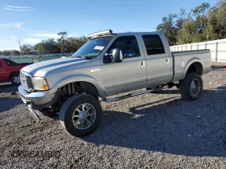 2003 Ford Super Duty F-250 XL with VIN 1FTNW21S23EB70707, listed as a Copart auction lot 87301404 with 95,820 mi miles and Salvage Title. Bid and sale history available at carsss.com. Image 1.