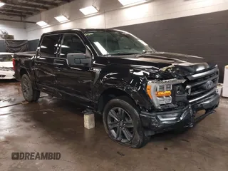 2023 Ford F-150 XL with VIN 1FTFW1E5XPKE80999, listed as a IAAI auction lot 41596993 with 33,285 mi miles. Bid and sale history available at carsss.com. Image 1.