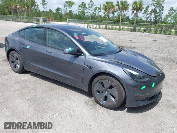 2023 Tesla Model 3 z VIN 5YJ3E1EA4PF461624, wystawiony jako IAAI lot #42433789 z przebiegiem 22 182 mil mil oraz . Historia ofert i sprzedaży dostępna na DreamBid. Obrazek 1.