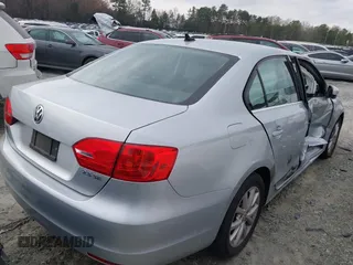 2013 Volkswagen Jetta Sedan SE with VIN 3VWDP7AJ3DM211027, listed as a IAAI auction lot 41849198 with 125,624 mi miles. Bid and sale history available at carsss.com. Image 4.