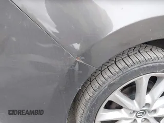 2017 Mazda 3 Touring with VIN 3MZBN1V73HM118104, listed as a IAAI auction lot 42139361 with 71,615 mi miles and . Bid and sale history available at DreamBid. Image 16.