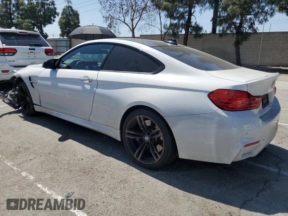 2015 BMW M4 with VIN WBS3R9C51FK334414, listed as a Copart auction lot 52451035 with 122,436 mi miles and Salvage title. Bid and sale history available at DreamBid. Image 2.