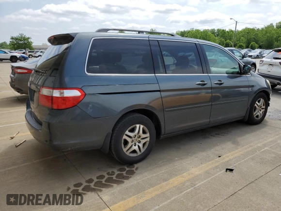 2006 Honda Odyssey EX with VIN 5FNRL38416B446272, listed as a Copart auction lot 57165545 with 219,042 mi miles and Salvage title. Bid and sale history available at DreamBid. Image 3.