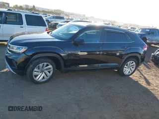 2021 Volkswagen Atlas SE with VIN 1V2WE2CA2MC221789, listed as a IAAI auction lot 41308009 with 53,627 mi miles and . Bid and sale history available at DreamBid. Image 14.