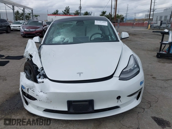 2021 Tesla Model 3 Long Range with VIN 5YJ3E1EB8MF860282, listed as a IAAI auction lot 41787008 with 49,730 mi miles and . Bid and sale history available at DreamBid. Image 12.