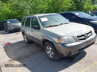 2003 Mazda Tribute LX with VIN 4F2YZ04113KM46727, listed as a IAAI auction lot 42196041 with Not Provided miles and . Bid and sale history available at DreamBid. Image 1.