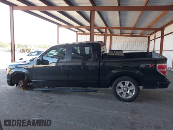 2014 Ford F-150 XL with VIN 1FTFW1CF9EKF87745, listed as a IAAI auction lot 42026883 with 221,307 mi miles. Bid and sale history available at carsss.com. Image 15.