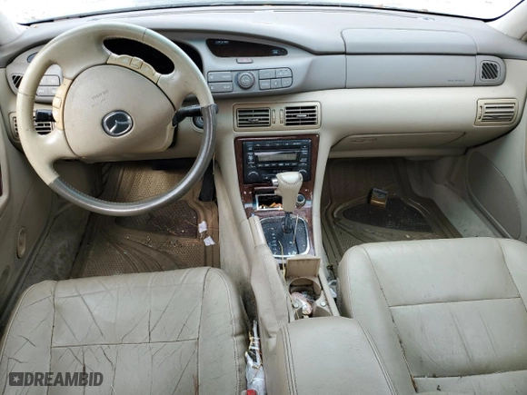 2001 Mazda Millenia with VIN JM1TA221011708952, listed as a Copart auction lot 64995014 with NaN miles and Salvage Title. Bid and sale history available at carsss.com. Image 8.