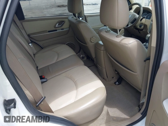 2006 Mercury Mariner Luxury with VIN 4M2YU56116KJ14472, listed as a IAAI auction lot 42349564 with 96,221 mi miles and . Bid and sale history available at DreamBid. Image 8.