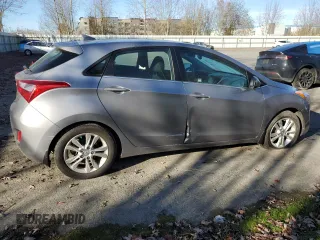 2013 Hyundai Elantra GT with VIN KMHD35LE9DU037412, listed as a Copart auction lot 79561274 with 54,619 mi miles and Salvage Title. Bid and sale history available at carsss.com. Image 3.