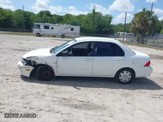 2002 Mitsubishi Lancer ES with VIN JA3AJ26E42U054430, listed as a IAAI auction lot 41918246 with 192,996 mi miles. Bid and sale history available at carsss.com. Image 14.