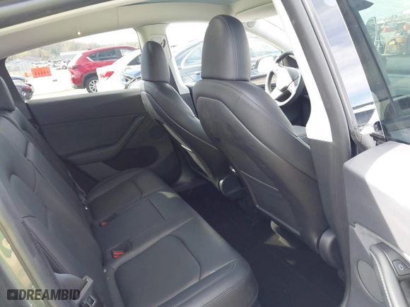 2023 Tesla Model Y Long Range with VIN 7SAYGDEE3PA204992, listed as a IAAI auction lot 41849104 with 22,490 mi miles. Bid and sale history available at carsss.com. Image 8.