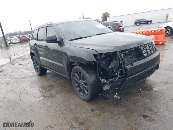 2021 Jeep Grand Cherokee Laredo X with VIN 1C4RJEAG1MC680282, listed as a IAAI auction lot 41466496 with 58,855 mi miles. Bid and sale history available at carsss.com. Image 1.