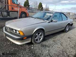 1986 BMW 6 Series 635CSi with VIN WBAEC8409G0613604, listed as a Copart auction lot 85919534 with 176,988 mi miles and Salvage Title. Bid and sale history available at carsss.com. Image 1.