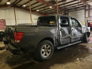 2010 Nissan Titan LE with VIN 1N6AA0EC2AN325657, listed as a Copart auction lot 88307625 with 147,010 mi miles and Salvage Title. Bid and sale history available at carsss.com. Image 3.