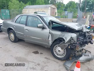 1998 Mercury Grand Marquis LS z VIN 2MEFM75W4WX676951, wystawiony jako IAAI lot #42177886 z przebiegiem Nie podano mil oraz . Historia ofert i sprzedaży dostępna na DreamBid. Obrazek 1.