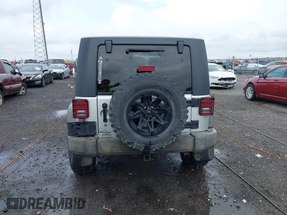 2007 Jeep Wrangler Unlimited X with VIN 1J4GA39187L209448, listed as a IAAI auction lot 42104328 with 138,302 mi miles and . Bid and sale history available at DreamBid. Image 16.