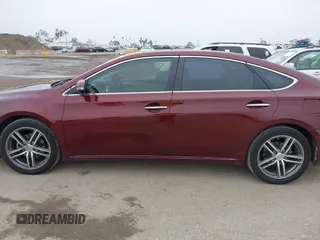 2013 Toyota Avalon XLE with VIN 4T1BK1EB1DU001297, listed as a IAAI auction lot 42041699 with 217,190 mi miles and . Bid and sale history available at DreamBid. Image 14.