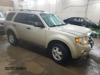 2012 Ford Escape XLT with VIN 1FMCU9D76CKC44981, listed as a Copart auction lot 57908795 with 127,594 mi miles and Salvage title. Bid and sale history available at DreamBid. Image 4.