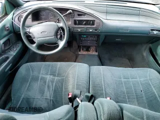 1994 Ford Taurus with VIN 1FALP5747RG236623, listed as a Copart auction lot 85242504 with 205,550 mi miles and Salvage title. Bid and sale history available at DreamBid. Image 8.