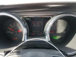 2005 Ford Mustang Deluxe with VIN 1ZVHT80N755201499, listed as a Copart auction lot 52082585 with 203,854 mi miles and Salvage Title. Bid and sale history available at carsss.com. Image 9.