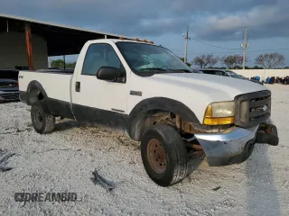 2000 Ford Super Duty F-250 XL with VIN 1FTNF21F7YEA97991, listed as a Copart auction lot 54577544 with 82,036 mi miles and Salvage Title. Bid and sale history available at carsss.com. Image 4.