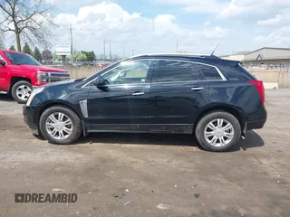2014 Cadillac SRX Luxury Collection z VIN 3GYFNEE32ES659705, wystawiony jako IAAI lot #42148269 z przebiegiem 140 560 mil mil oraz . Historia ofert i sprzedaży dostępna na DreamBid. Obrazek 14.