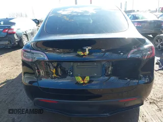 2024 Tesla Model Y with VIN 7SAYGDED5RF093018, listed as a IAAI auction lot 41747467 with 60,469 mi miles and . Bid and sale history available at DreamBid. Image 16.