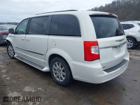 2012 Chrysler Town & Country Touring with VIN 2C4RC1BG9CR278341, listed as a IAAI auction lot 41952677 with 123,282 mi miles and . Bid and sale history available at DreamBid. Image 3.