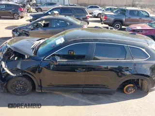 2018 Mazda CX-9 Sport with VIN JM3TCBBY6J0222750, listed as a IAAI auction lot 42294464 with 63,927 mi miles and . Bid and sale history available at DreamBid. Image 14.