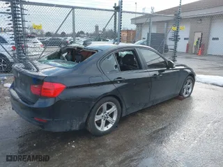 2014 BMW 3 Series 328i xDrive with VIN WBA3B3G58ENR83365, listed as a IAAI auction lot 41684711 with 141,669 mi miles. Bid and sale history available at carsss.com. Image 4.
