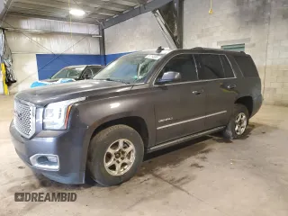 2015 GMC Yukon Denali with VIN 1GKS2CKJ2FR677604, listed as a Copart auction lot 51714505 with 146,648 mi miles and Salvage Title. Bid and sale history available at carsss.com. Image 1.