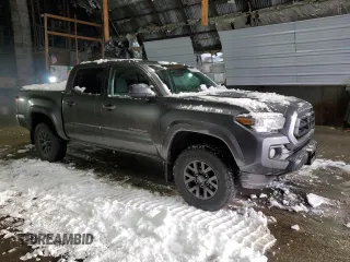 2021 Toyota Tacoma 4WD SR with VIN 3TYCZ5AN3MT028022, listed as a Copart auction lot 43699105 with 36,204 mi miles and Salvage Title. Bid and sale history available at carsss.com. Image 4.