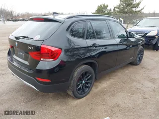 2015 BMW X1 xDrive28i with VIN WBAVL1C57FVY28856, listed as a IAAI auction lot 41695075 with 96,264 mi miles. Bid and sale history available at carsss.com. Image 4.