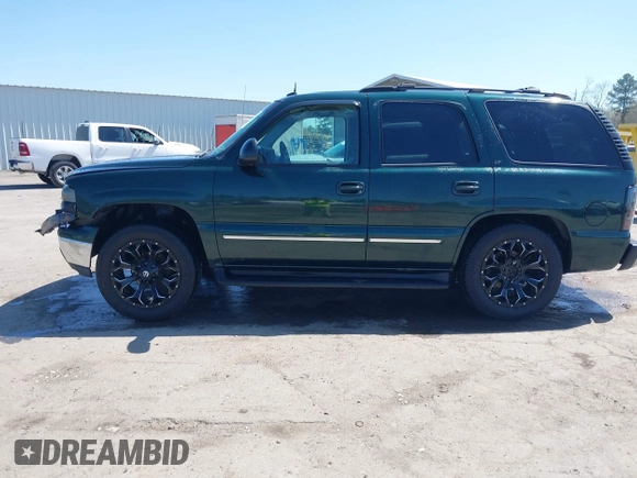2004 Chevrolet Tahoe LS with VIN 1GNEK13Z74J182853, listed as a IAAI auction lot 41919117 with 141,188 mi miles. Bid and sale history available at carsss.com. Image 14.