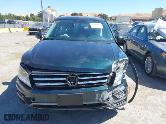 2018 Volkswagen Tiguan S with VIN 3VV1B7AX1JM165641, listed as a IAAI auction lot 42699622 with 75,354 mi miles and . Bid and sale history available at DreamBid. Image 11.
