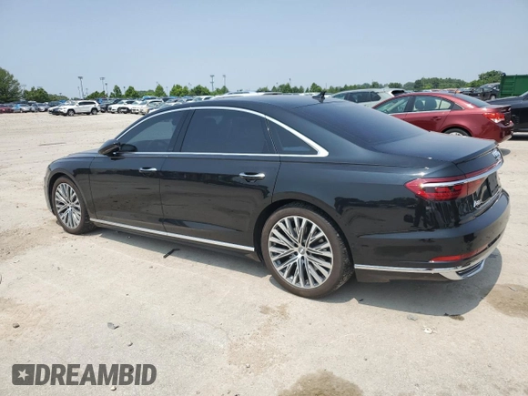 2019 Audi A8 with VIN WAU8DAF82KN020487, listed as a Copart auction lot 60214005 with 75,895 mi miles and Salvage title. Bid and sale history available at DreamBid. Image 2.